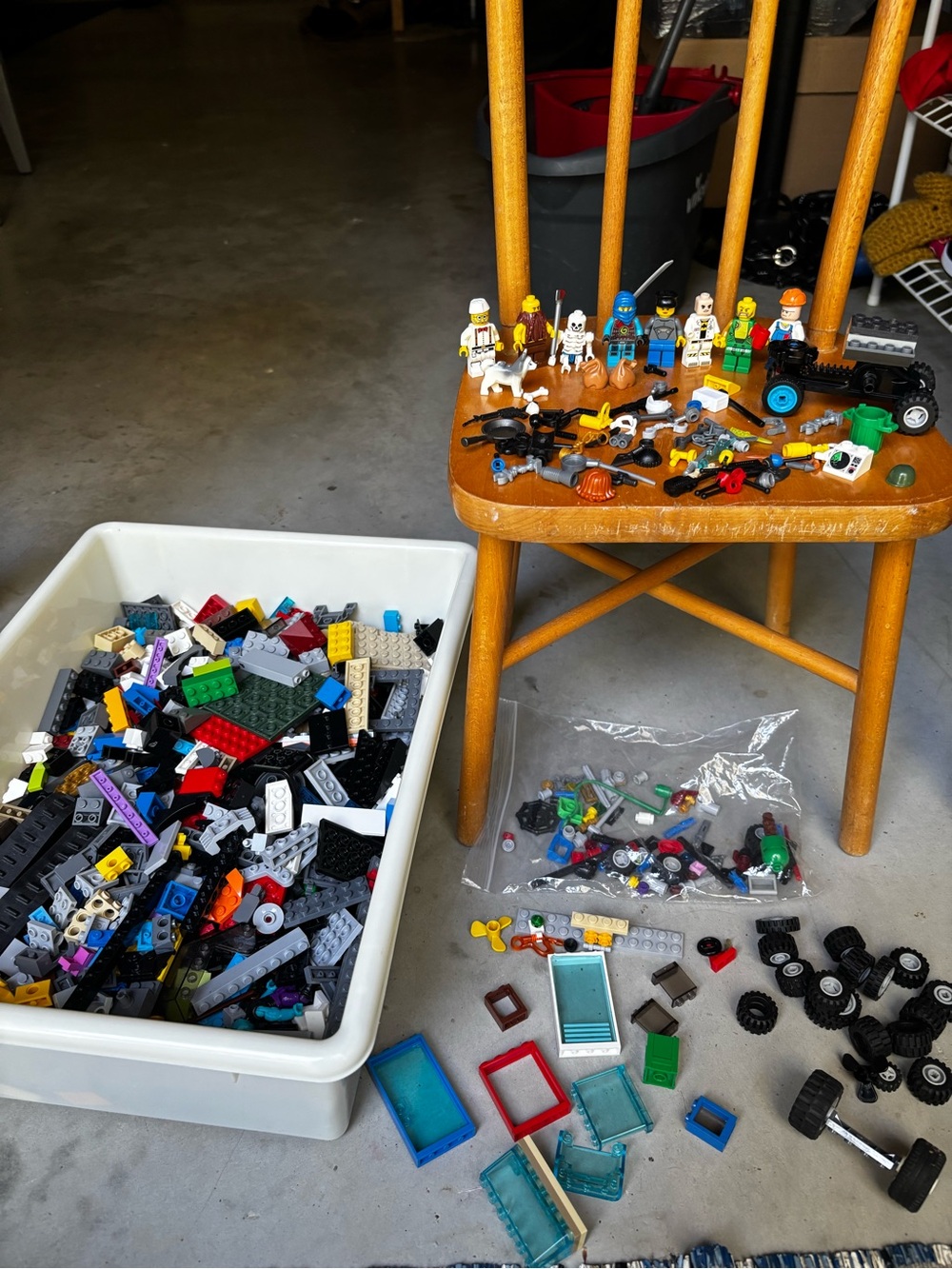 Legos with mini figures and accessories with bin